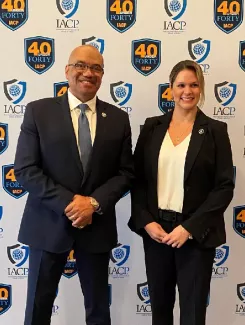 Director Davis with IACP 40 Under 40 Award Recipient Assistant Chief Maggie Barone